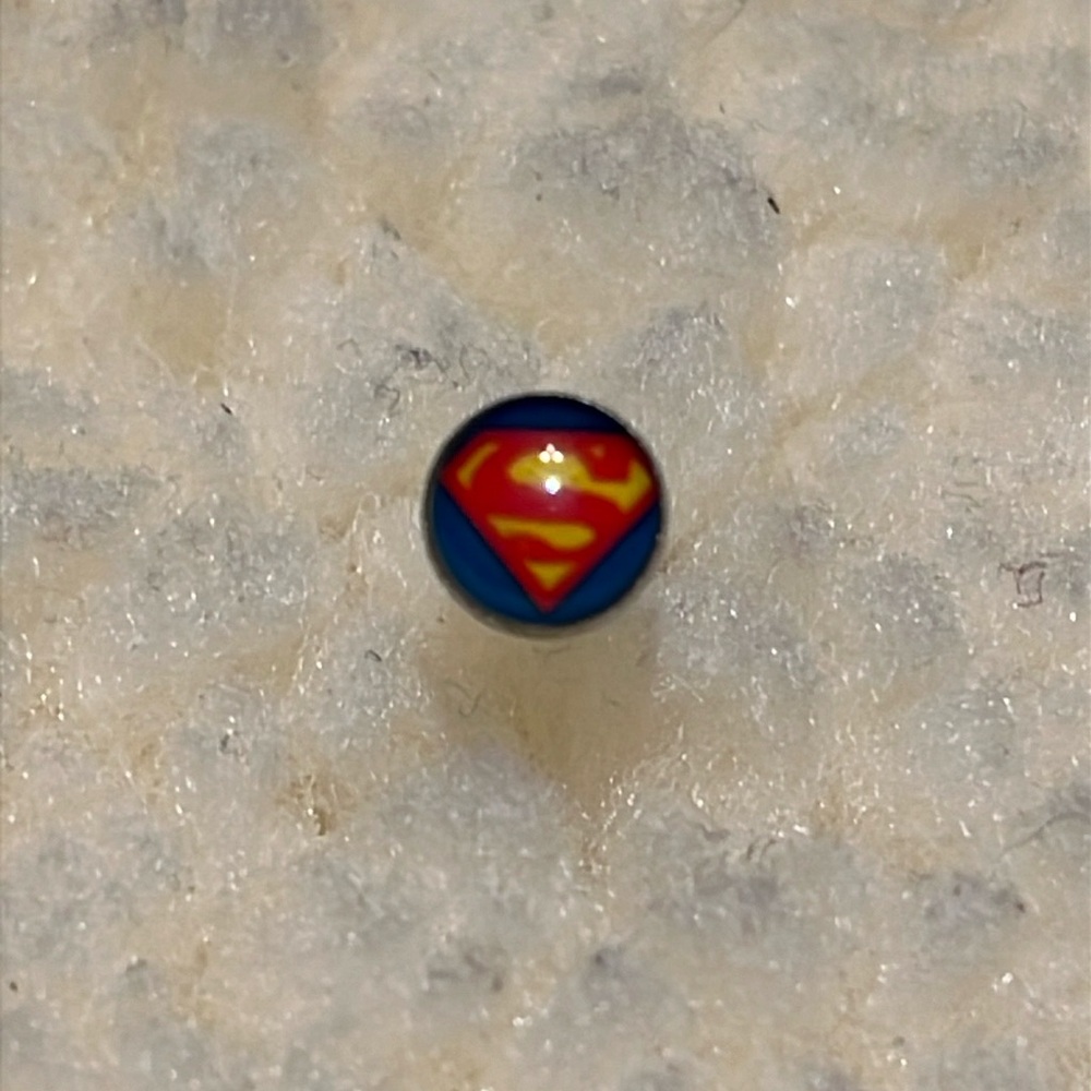 Superman Emblem Piercing
